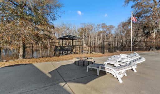 View of patio area featuring a gazebo and an outdo