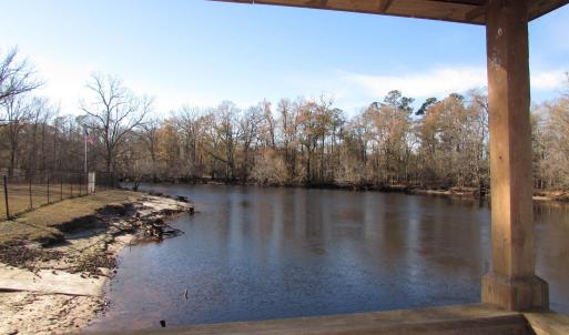 View of the river from the gazebo with fencing, ga