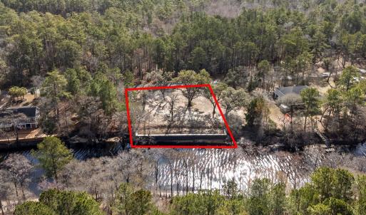 Aerial view of property's location with property p