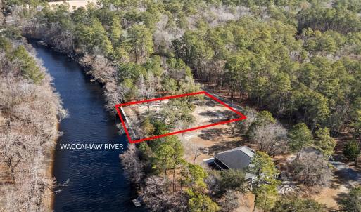 Aerial view of property and surrounding area featu