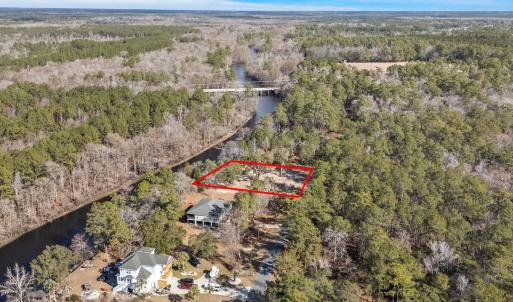 Aerial view of property's location with a nearby b