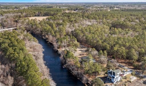 Bird's eye view of a large body of water and a for