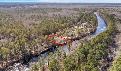 Aerial view of property's location with a nearby b