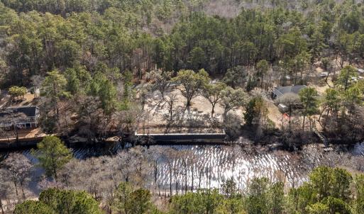 Aerial view of property and surrounding area with