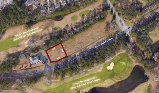 Aerial view of property's location featuring a gol