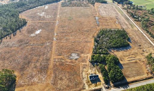 Aerial view of property and surrounding area featu