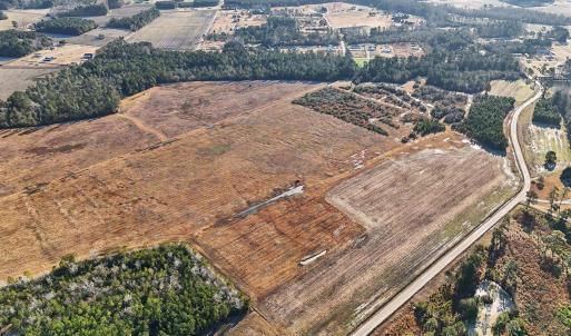 Aerial view of property and surrounding area featu