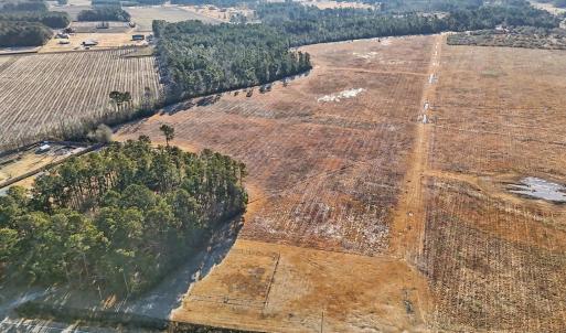 Aerial view of sparsely populated area featuring f