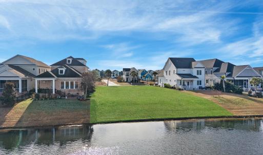 Water view featuring nearby suburban area