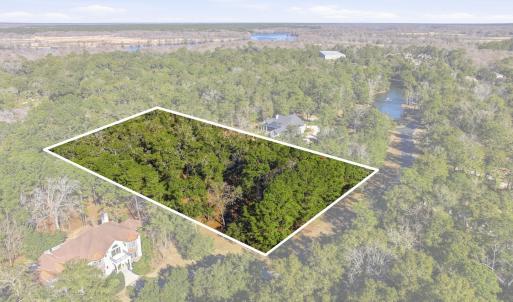 Aerial view of property's location with a nearby b