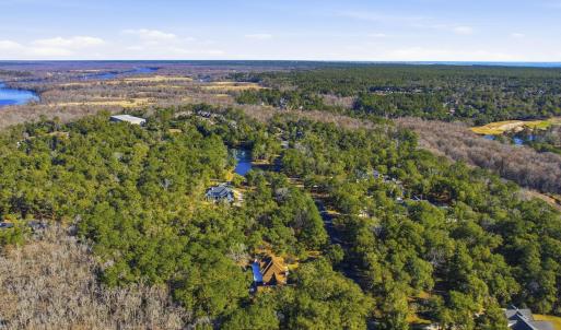 Aerial view of property's location with a nearby b