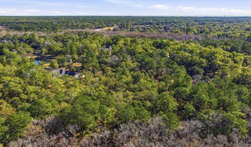 Aerial overview of property's location with a heav