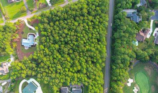 Aerial view of property and surrounding area with