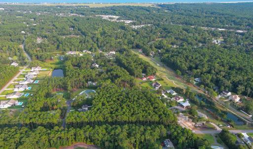 Aerial view of property's location featuring a nea