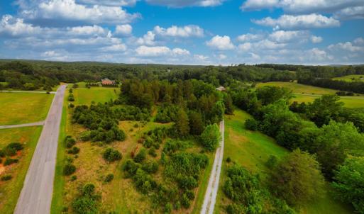View down gravel drive and Two Bid Road