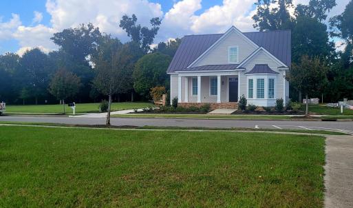Looking at the house across the street o