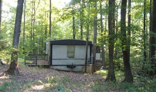 Abandoned mobile home.  Home is not in liveable condition.