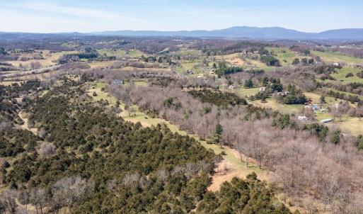 In 2023 a great deal more land was cleared to provide more open space and provide beautiful views of the Blue Ridge Mountains. These improvements are not reflected in these drone shots.