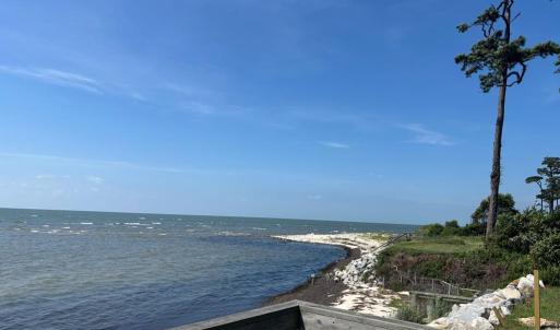 Private community beach at high tide