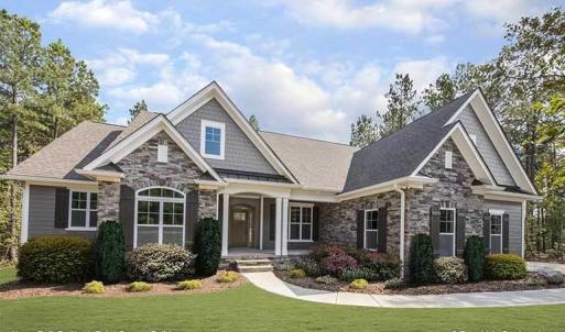 This is an example of the House Plan that is approved for affluent Crown Ridge Estates. As of 2024 the value of the home being built and the one starting construction soon is $1,000,000 to $1,300,000. Purchasers should anticipate to spend 1M turn key.