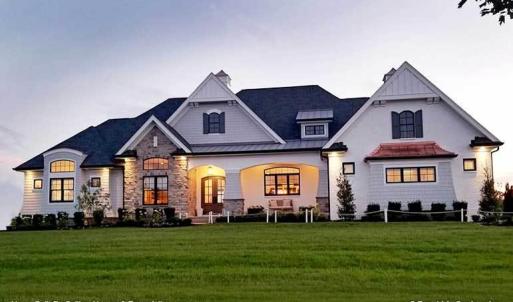 This is an example of the House Plan that is approved for affluent Crown Ridge Estates. As of 2024 the value of the home being built and the one starting construction soon is $1,000,000 to $1,300,000. Purchasers should anticipate to spend 1M turn key.