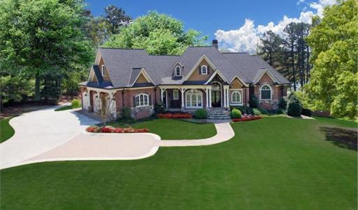 This is an example of the House Plan that is approved for affluent Crown Ridge Estates. As of 2024 the value of the home being built and the one starting construction soon is $1,000,000 to $1,300,000. Purchasers should anticipate to spend 1M turn key.