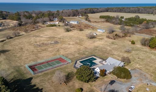 View of clubhouse and tennis court