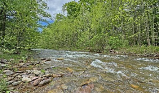 Down the Hill from Building Site is Ramsey’s Draft (Borders Property).  Down the Hill is Steep so Creating a Trail would be a Good Project for New Owner.