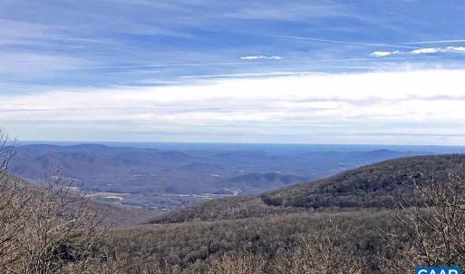 Similar Valley and Mountain views are available upon construction. This is the view from the home immediately to the left of the homesite.
