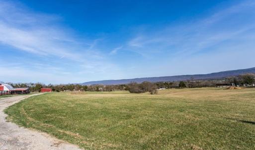 with lane to home site and pole shed.