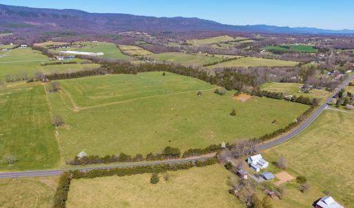 East Point Road frontage looking due north.  In view is the grazing pasture, with hay pasture just beyond.