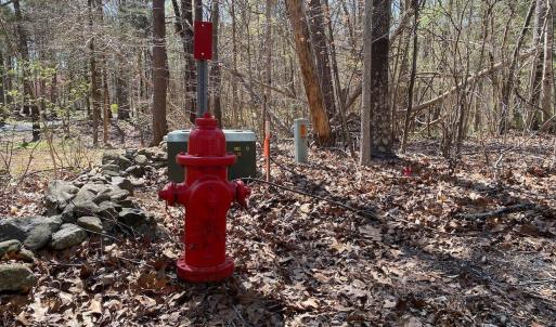 Underground electric routed to property and also access to an adjacent fire hydrant