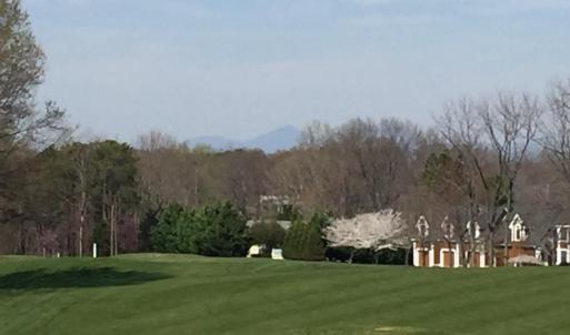 a view of #6 fair way with peaks of Otte