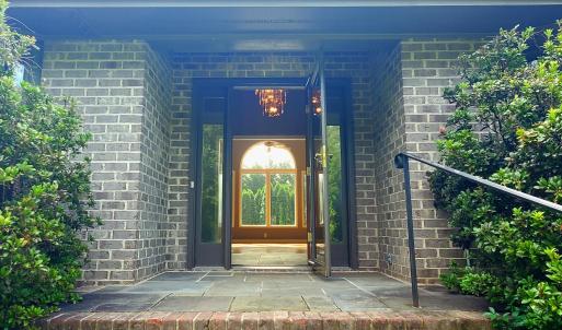 Recessed entry portico with sidelights