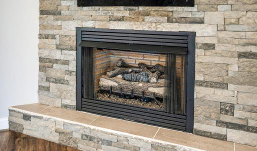 Gas log fireplace
