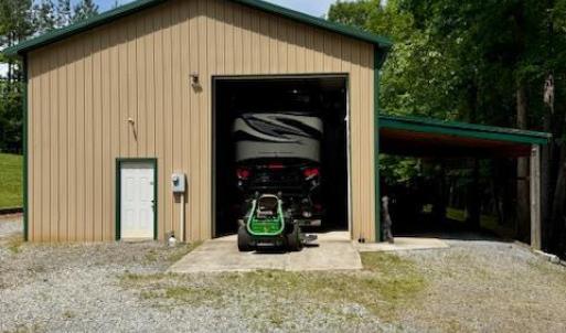 Pole barn with loft that can store your motor home/camper.  Has electric, diesel tank, and water storage with sink.