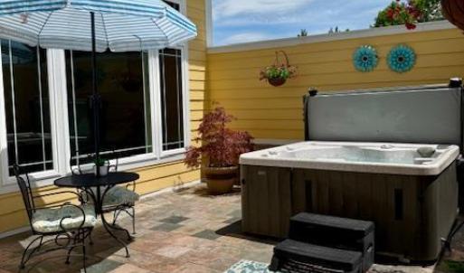 private patio area off Master with hot tub