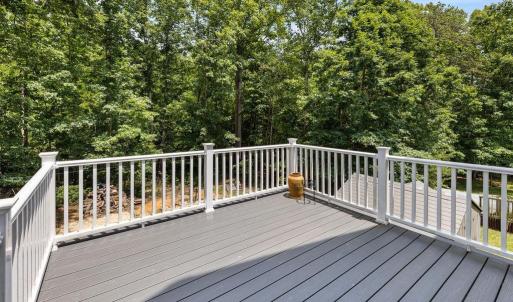 The seller is a builder and has done a lot of work to things over the years. This deck was recently refurbished with new trex flooring and new railing.