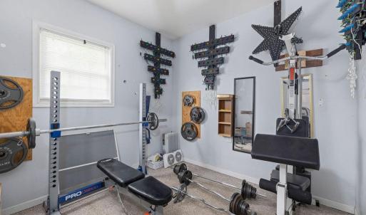 Surprise!! There is a workout room in the back of the garage! (also could have lots of other fun uses!)