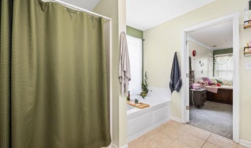 A full shower and a separate tub to relax in!