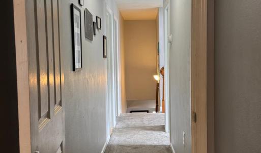 heading down the hallway for 2 more bedrooms