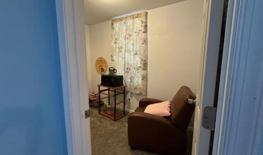 Entering the 5th bedroom which is located here off the den.