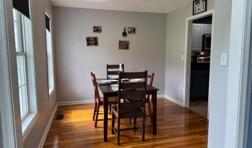 The Dining Room on the front of the house with adjacent kitchen.