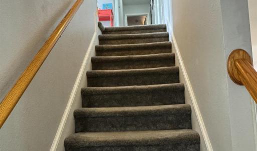 Upstairs are 4 bedrooms and 2 full Baths.