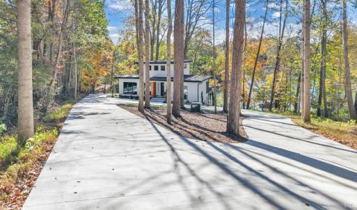 One of the few properties on County Sewer!  Offers a long concrete driveway with tons of parking for family and guest! Literally walking distance to several area restaurants!