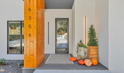 Welcome home to your oasis at 16358 Moneta Road!