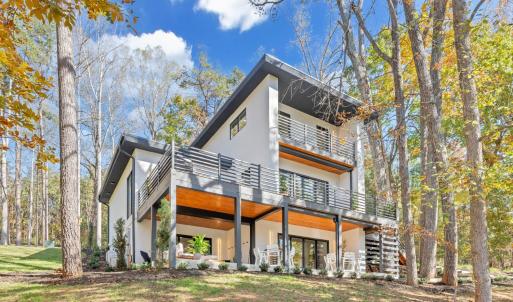 THIS PROPERTY IS ON COUNTY SEWER AT THE LAKE!  This contemporary new construction lake front home is located at one of the most convenient locations on the lake! Only minutes to Bridgewater offering marina, shopping, dining, live music, coffee shop, ice cream, mini golf, and more!