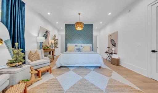 The primary ensuite offers a private oasis including a second laundry space!