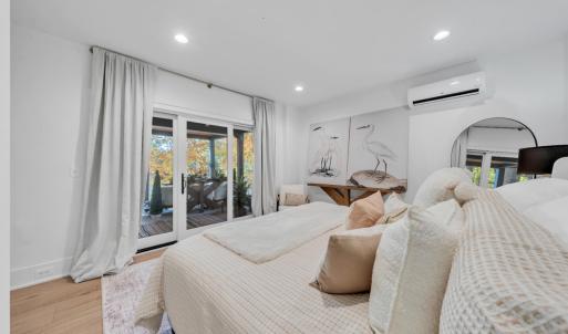 Terrace level bedroom with private covered outdoor space overlooking the lake!