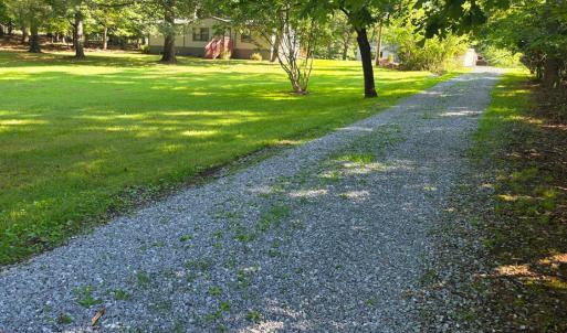 the long gravel driveway offers seclusion